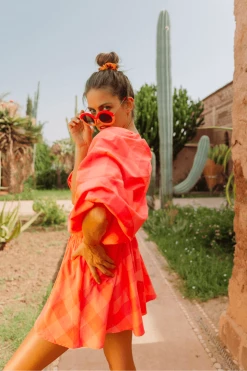 Sundress Alicia Neon Coral Gingham Romper