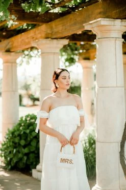 Confête Hayley Off-the-Shoulder Ruffle Tiered Mini Dress